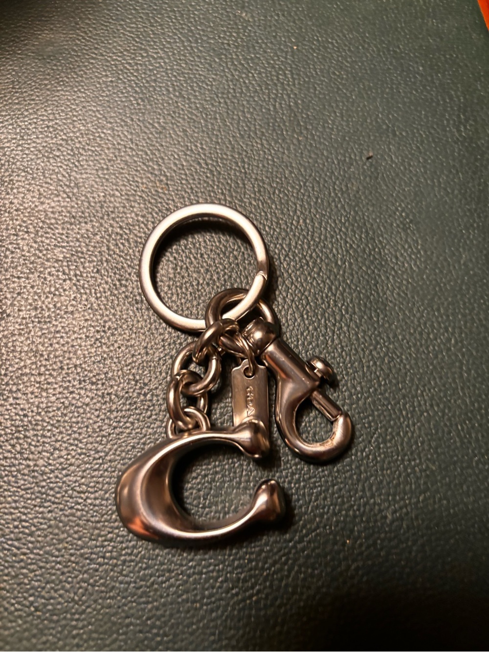 Silver Coach bag charm